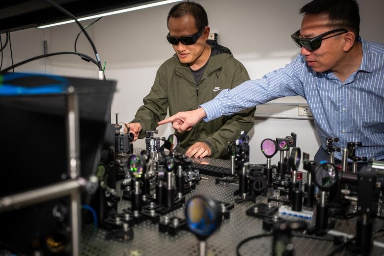 Tianwei Wu and Professor Liang Feng Training AI With Light