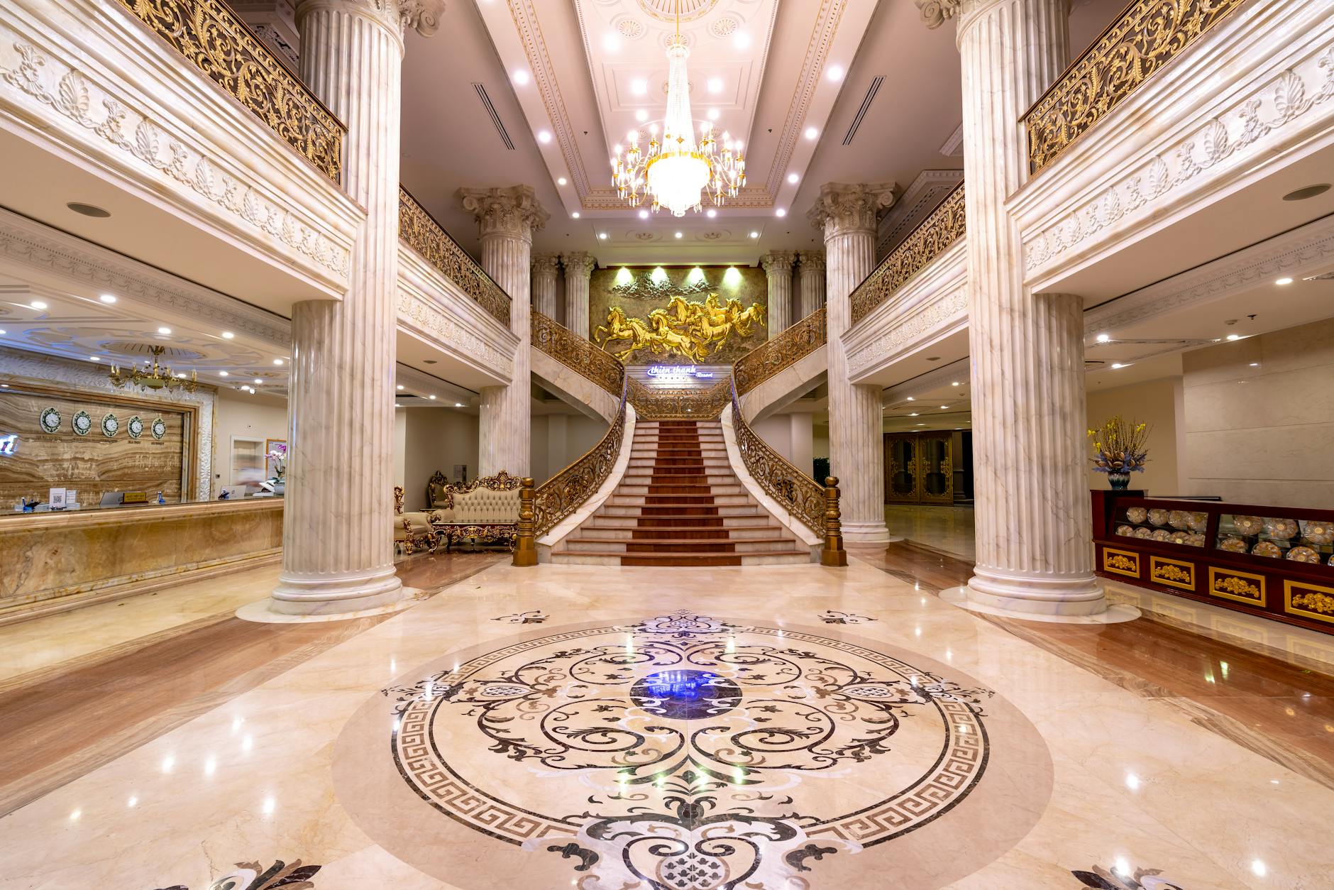 Elegant hotel lobby with modern furnishings and reception area where AI concierge robots operate