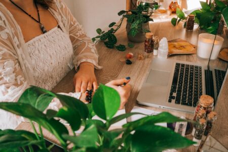 Employees practicing meditation in a modern office space during a workplace wellness session