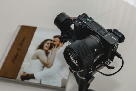 Professional camera and editing equipment used by wedding photographers