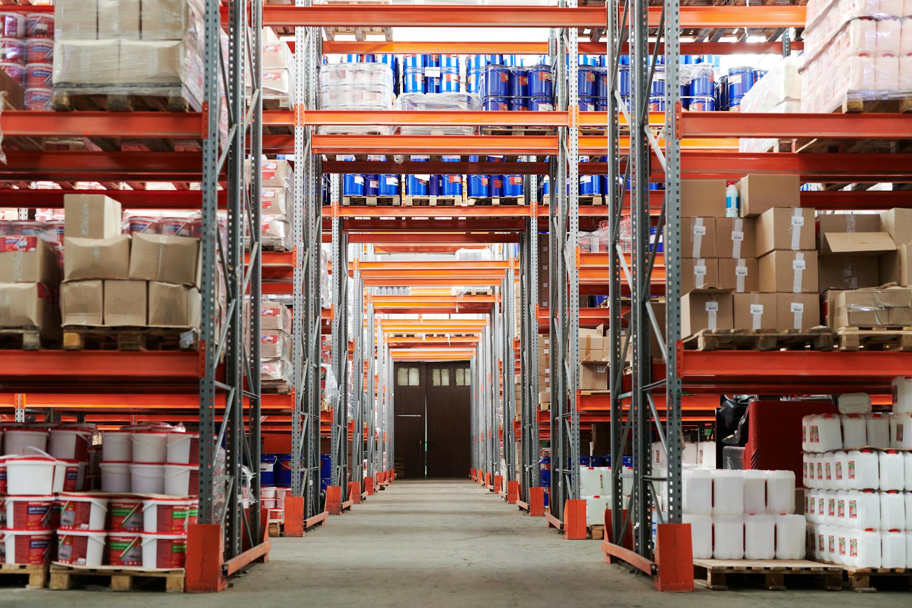 Modern warehouse interior with organized shelving and logistics operations