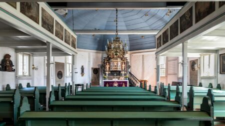 Modern church interior with lighting and video screens for streaming services
