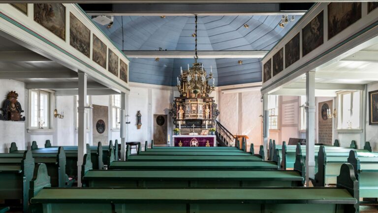 Modern church interior with lighting and video screens for streaming services