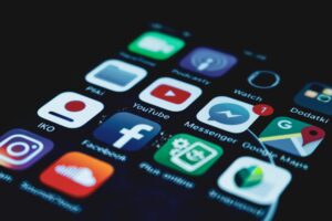 How AI-Powered Language Learning Apps Are Replacing Traditional Tutors Close-up of smartphone displaying a colorful language learning app interface with lesson progress indicators