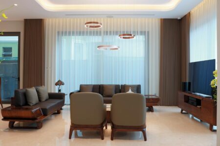 How Augmented Reality Try-Ons Are Transforming Online Furniture Shopping Modern living room with sectional sofa and coffee table showing furniture arrangement