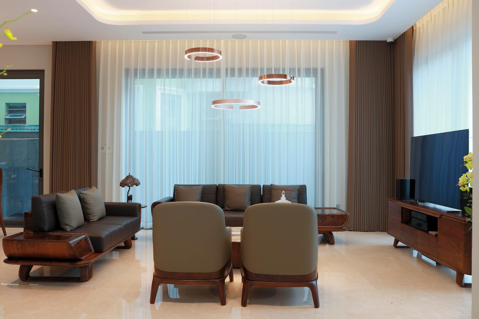 Modern living room with sectional sofa and coffee table showing furniture arrangement