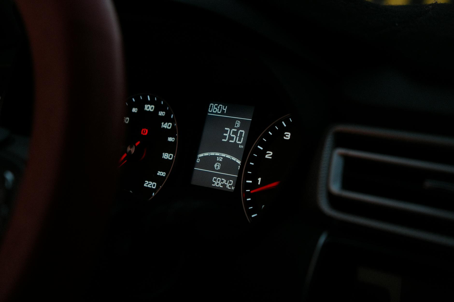Modern car interior dashboard displaying advanced driver assistance technology interfaces