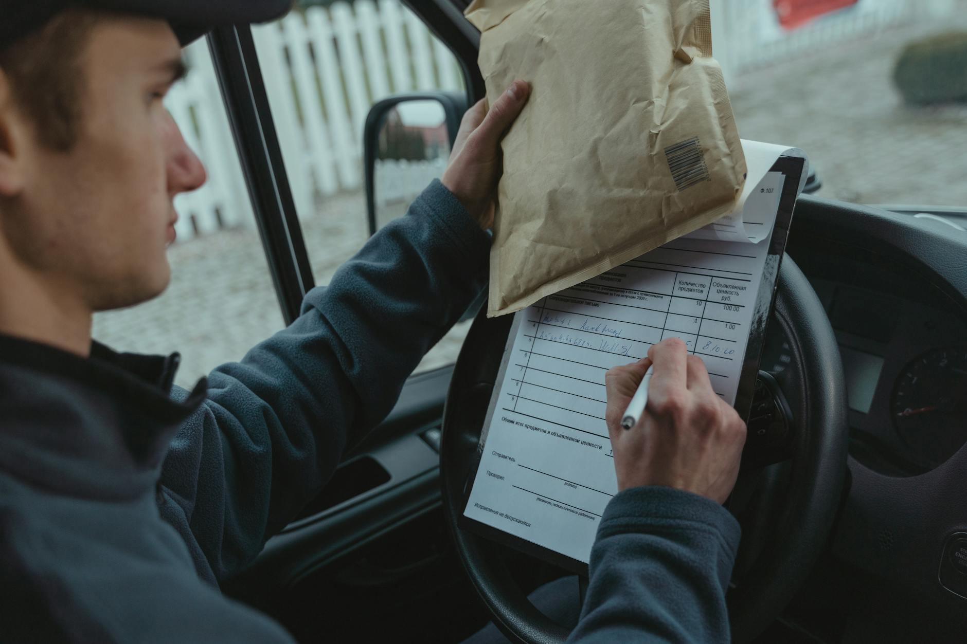 Delivery person carrying grocery bags and packages to customer door