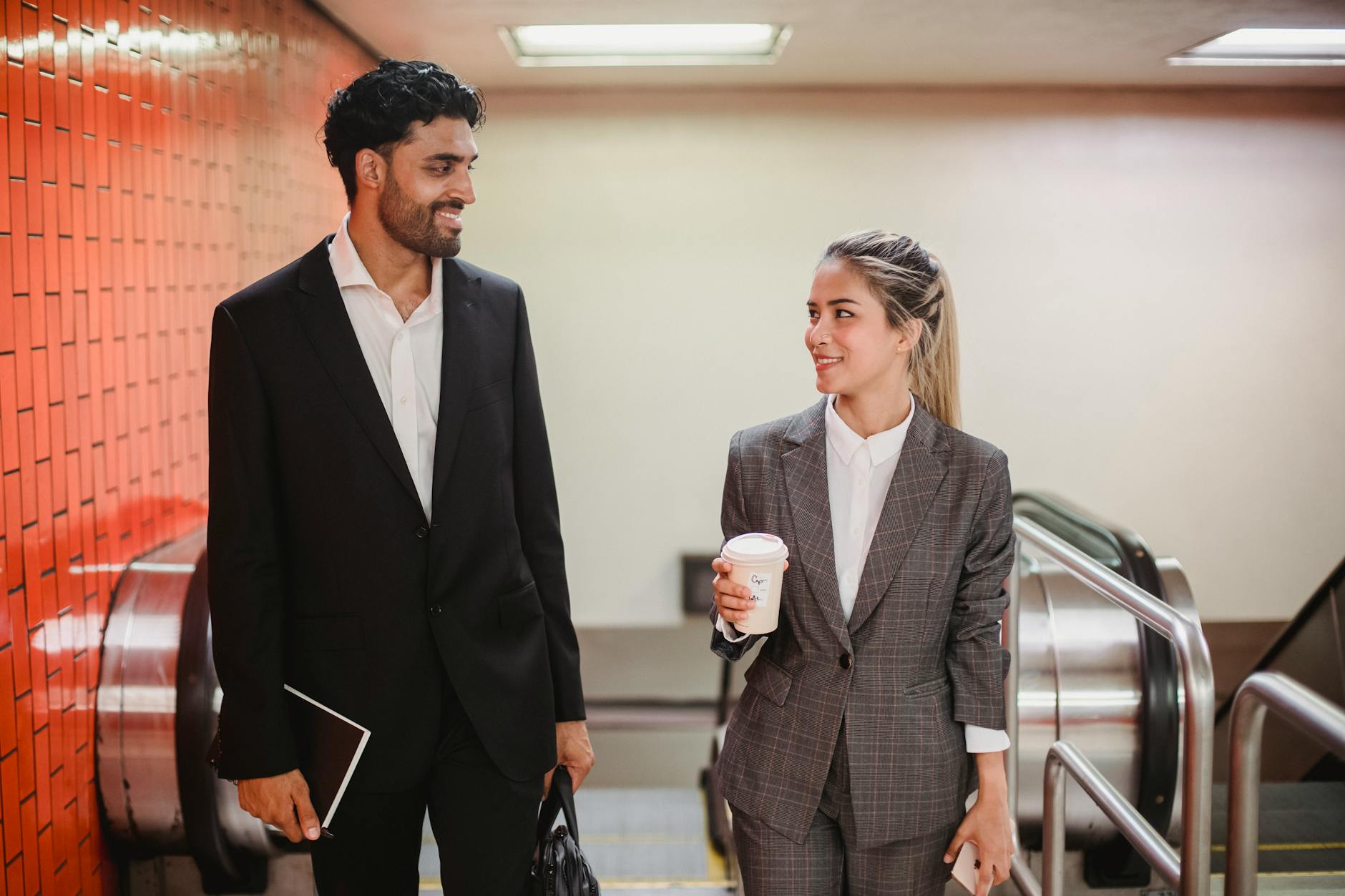 Professional person using smartphone in modern office environment