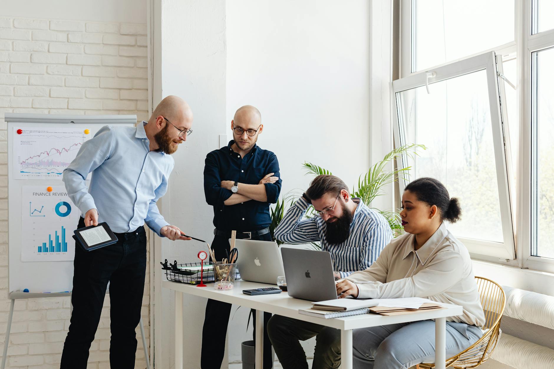 Business meeting in progress with participants wearing headphones