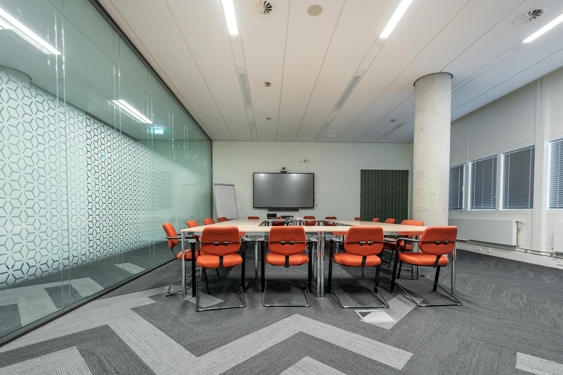 Corporate meeting room with professionals discussing business strategy