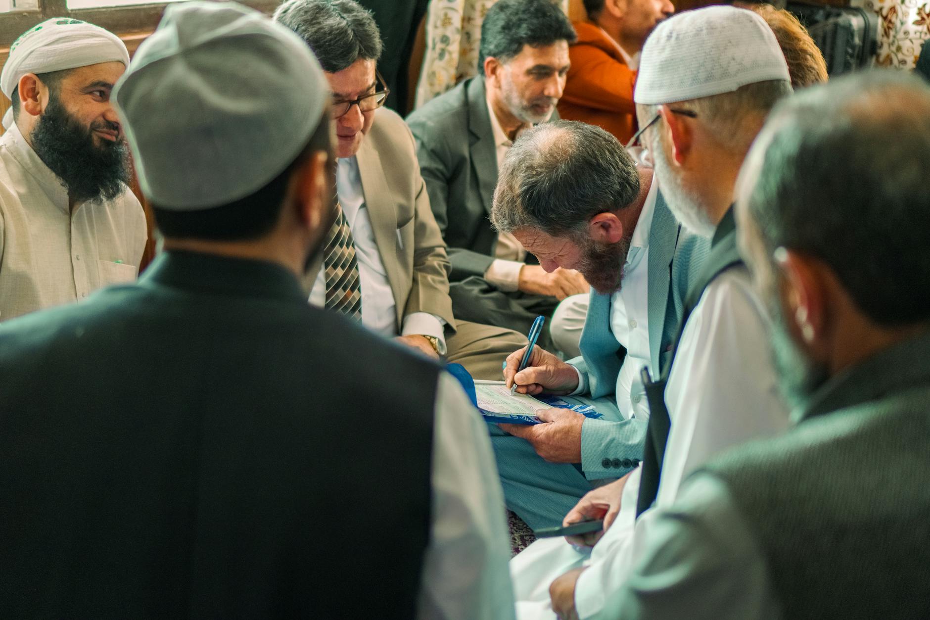 Group of young professionals having discussion in modern shared space