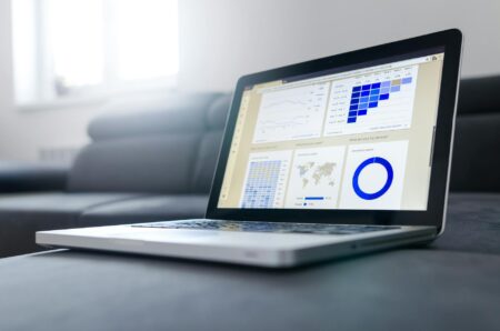 Gamma’s AI Presentation Tool Is Cutting Into PowerPoint’s Market Share Person working on a presentation using a laptop at a desk