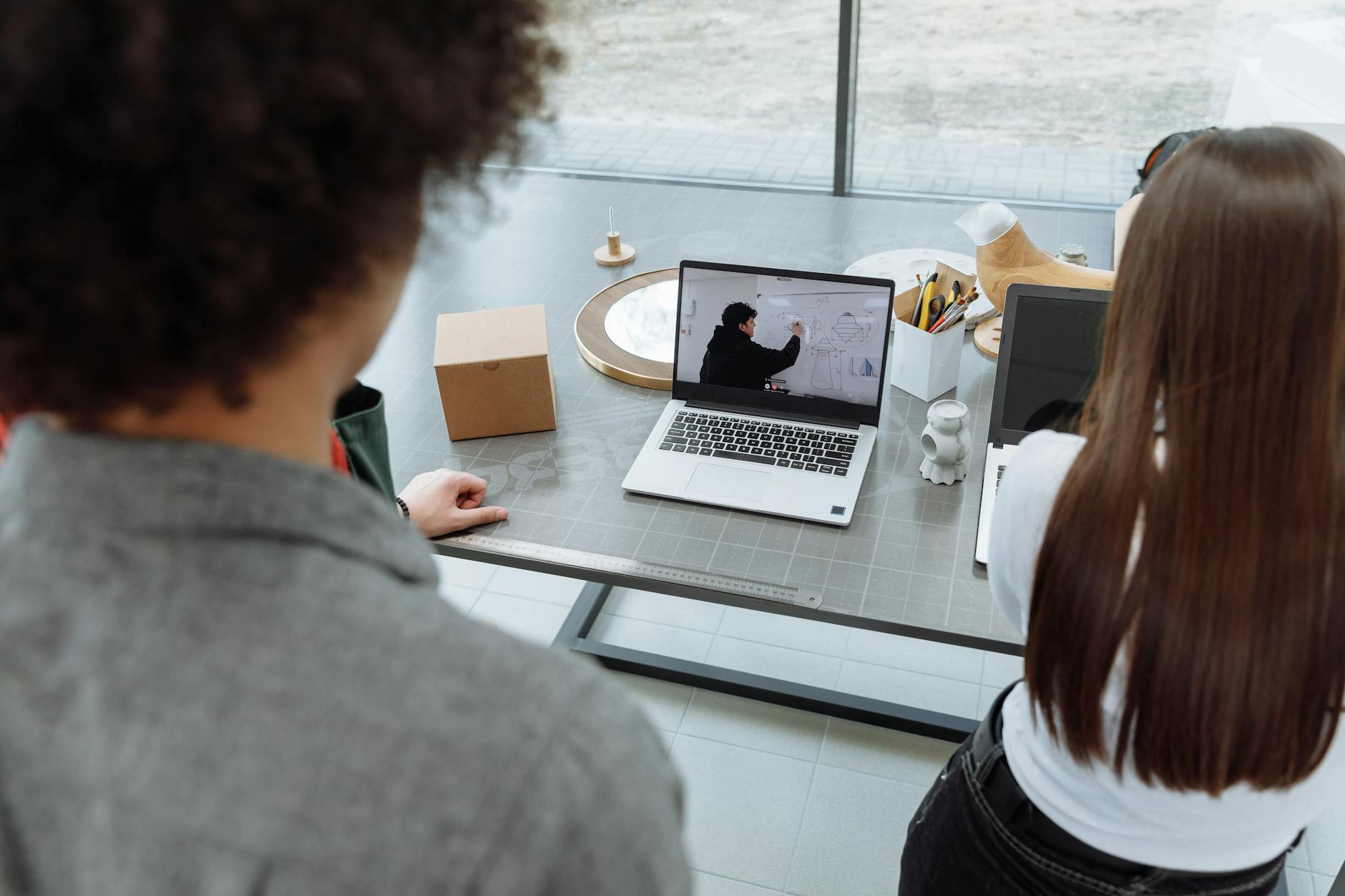 Remote team members working across different locations on laptops