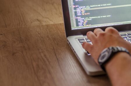 Vercel’s Frontend Platform Is Pulling Developers Away from AWS A developer working on a laptop, representing frontend engineering workflows