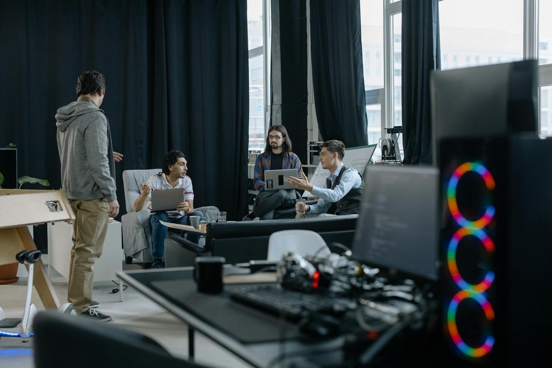 A software engineering team collaborating in an open office environment