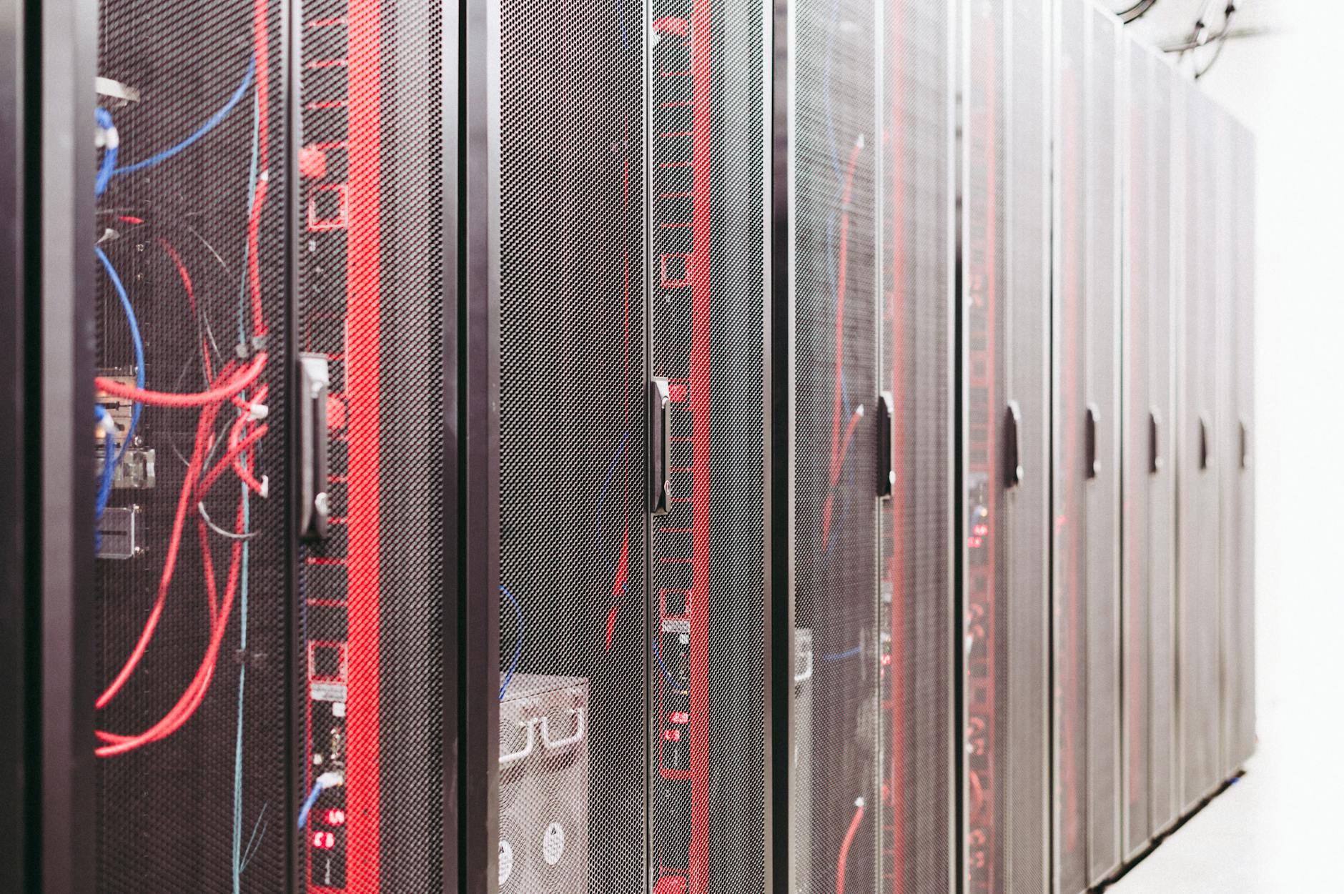 Rows of servers inside a large data center facility