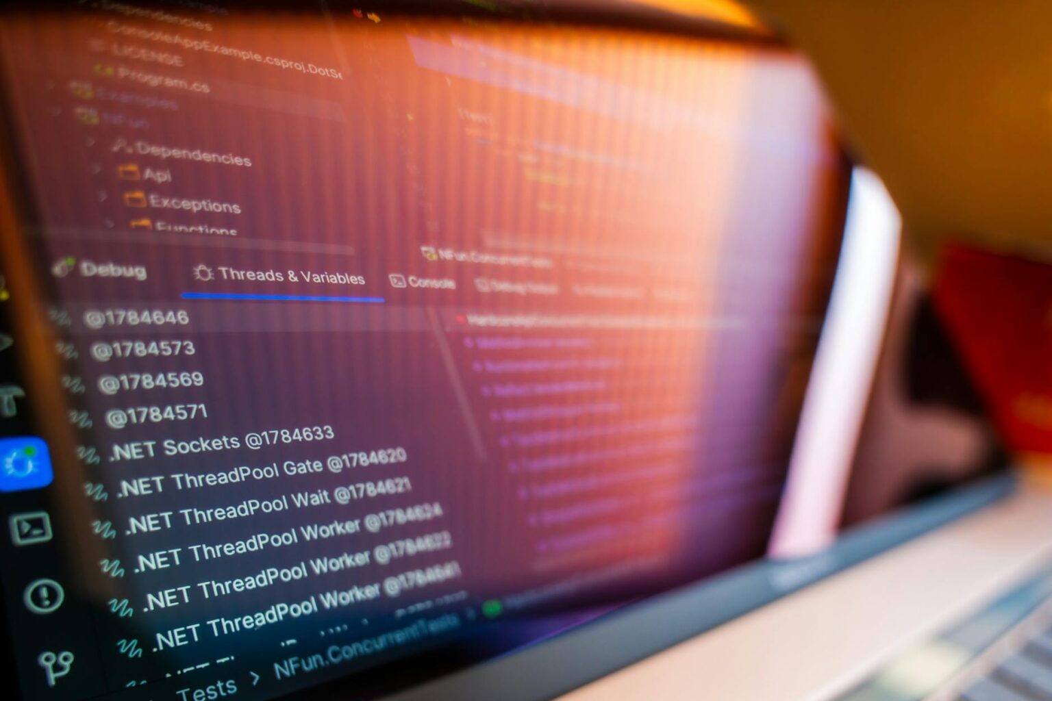 A laptop screen displaying lines of code in a browser-based development environment