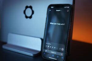 Perplexity’s AI Assistant App Is Crowding Siri’s Loyal Users Person holding a smartphone using a voice assistant app