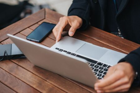Andela’s Talent Network Is Losing Ground to Contra’s Freelance Push Remote tech workers collaborating on laptops in a modern workspace