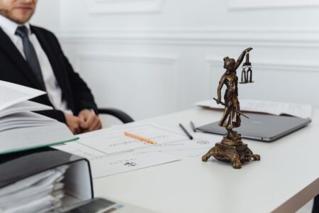 Lexi’s AI Legal Assistant Is Undercutting LexisNexis’s SMB Base Attorney reviewing legal documents at a desk, representing small law firm research workflow