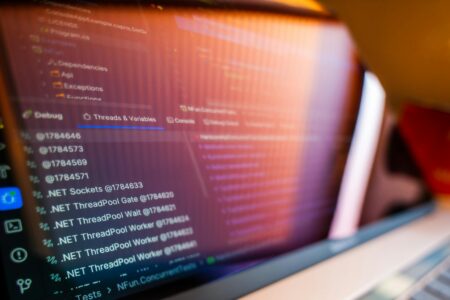 Replit’s Coding Platform Is Pulling Non-Developers Into App Building A laptop screen displaying lines of code in a browser-based development environment