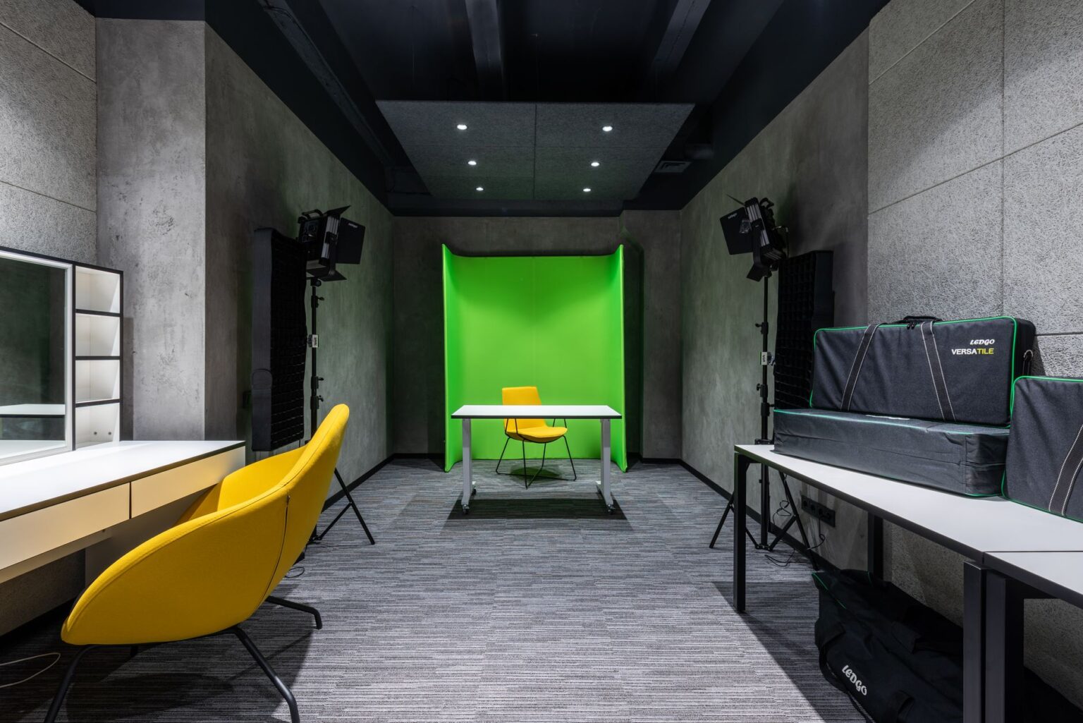 A professional video production studio setup representing corporate video creation tools