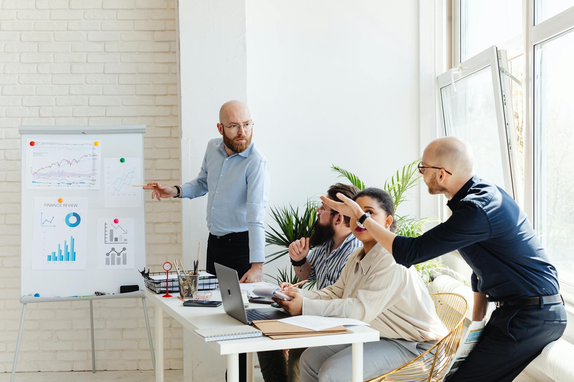 Business team reviewing software tools in a corporate meeting room