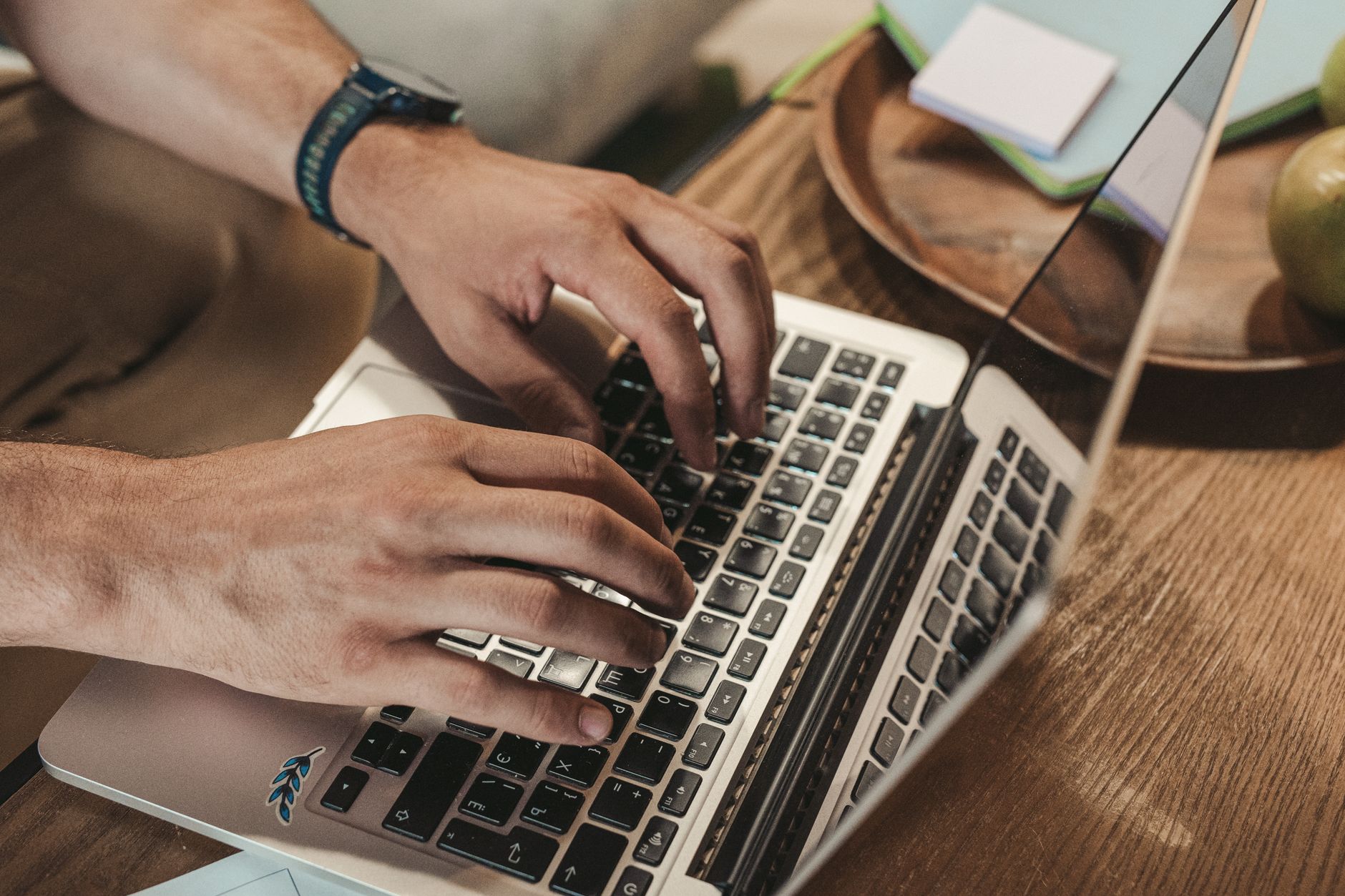 Person working on a laptop with productivity software open on screen
