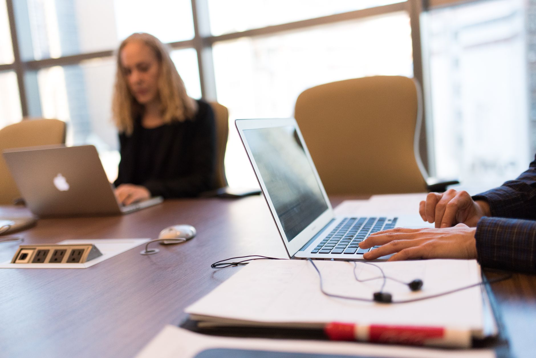 Business professionals reviewing technology strategy in a corporate meeting room