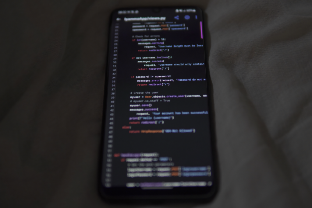 Developer reviewing an AI workflow diagram on a monitor