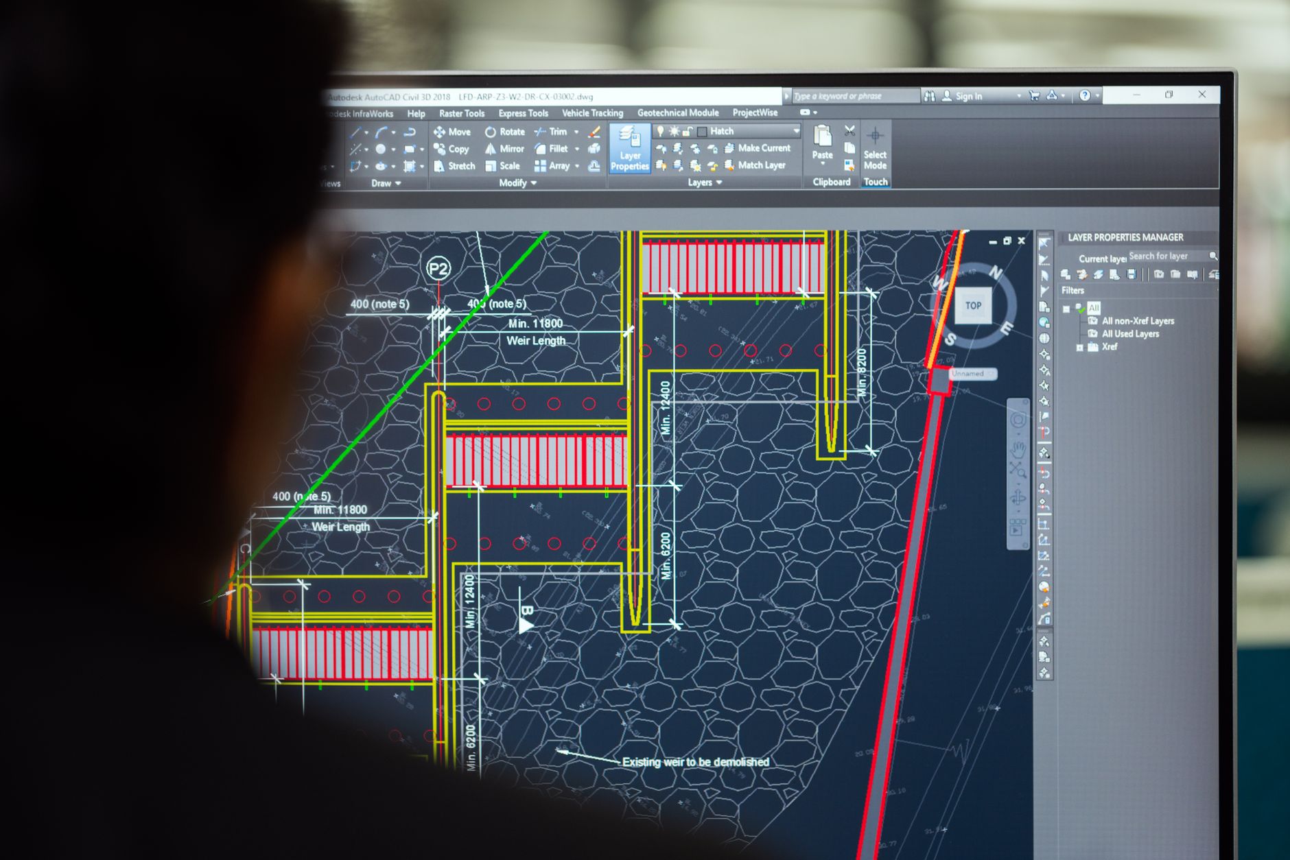 Designer working on a UI layout in a digital design application