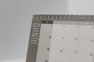 Notion’s Calendar Push Is Squeezing Cron’s Power User Base A clean desk workspace with a calendar and laptop open for daily planning