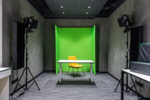 Pika’s Video AI Is Pulling Motion Budgets Away from Runway A modern video production studio with screens displaying digital editing software