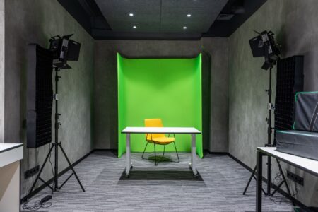 Pika’s Video AI Is Pulling Motion Budgets Away from Runway A modern video production studio with screens displaying digital editing software