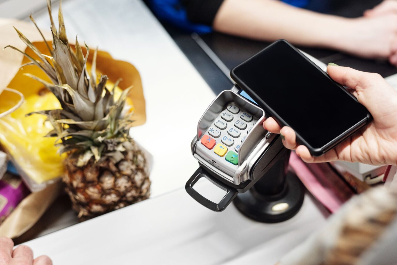 Klarna’s Checkout Push Is Squeezing Stripe’s SMB Payments Base Person completing a purchase on a smartphone checkout screen