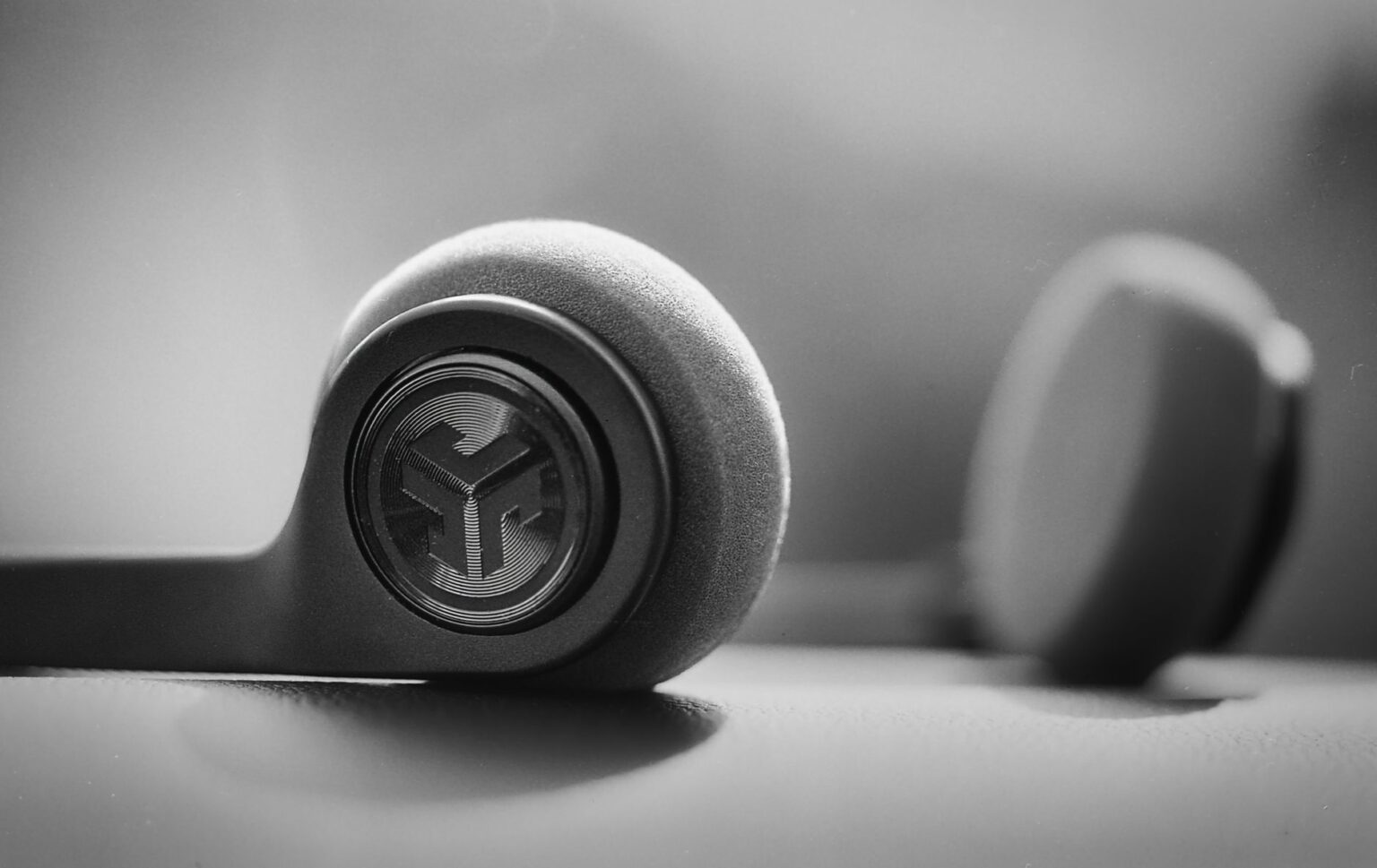 Speechify’s Audio AI Is Quietly Draining Audible’s Subscriber Base Person wearing headphones listening to audio content on a smartphone