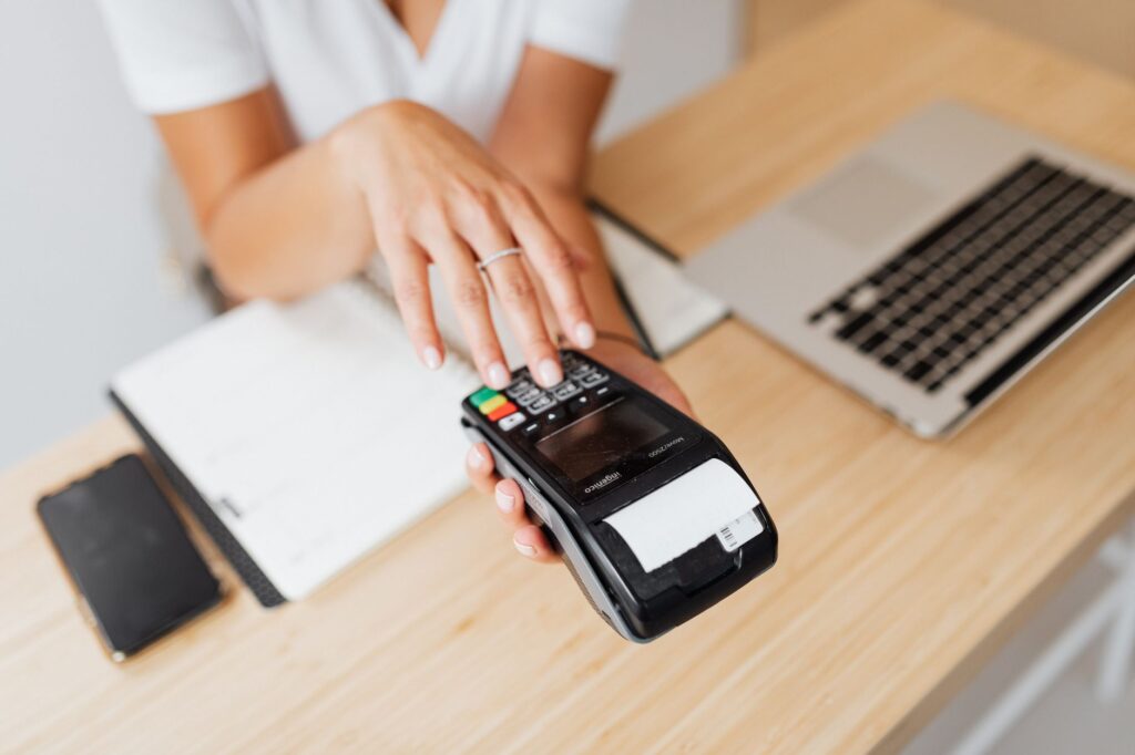 Mercoa’s B2B Payments API Is Squeezing Bill.com’s SMB Base A person using a laptop to manage business payments and invoices online