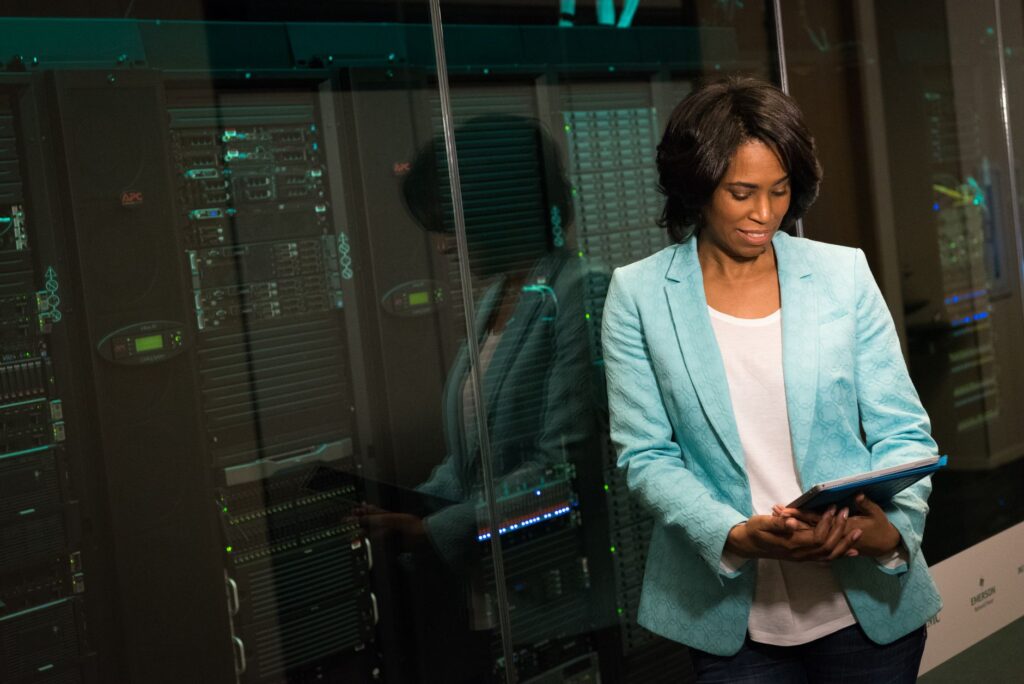 Vercel’s AI Deployment Push Is Crowding Netlify’s Frontend Base Rows of servers in a modern data center representing cloud deployment infrastructure