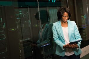 Vercel’s AI Deployment Push Is Crowding Netlify’s Frontend Base Rows of servers in a modern data center representing cloud deployment infrastructure