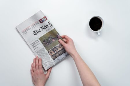 Digital news content displayed on a modern screen, representing publisher and tech platform relationships