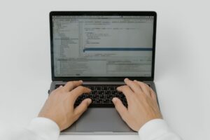 Replit’s Agent Mode Is Crowding Vercel’s v0 Prototyping Base Developer working on a web application in a browser-based code editor