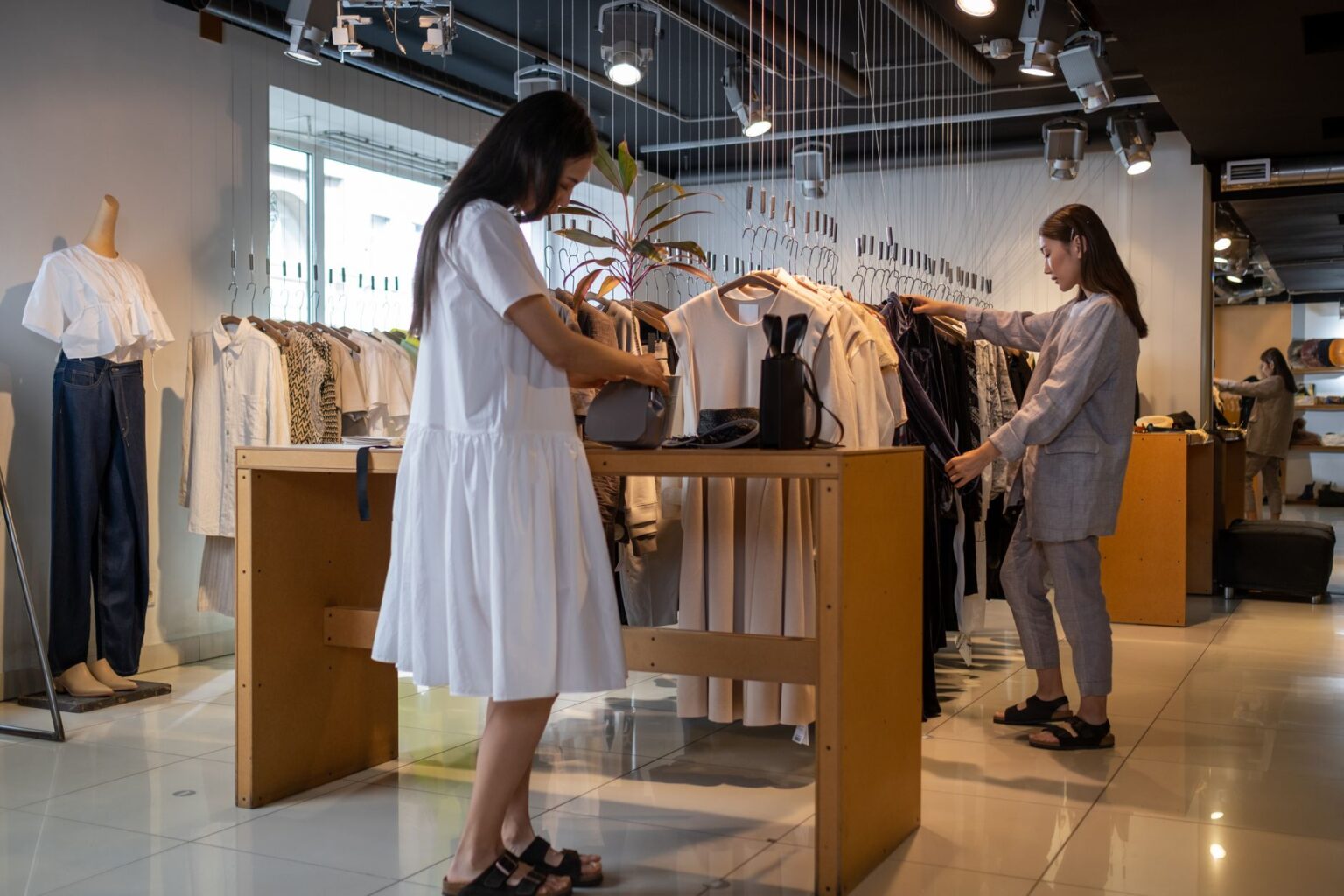 Modern retail store interior with digital displays and product shelving