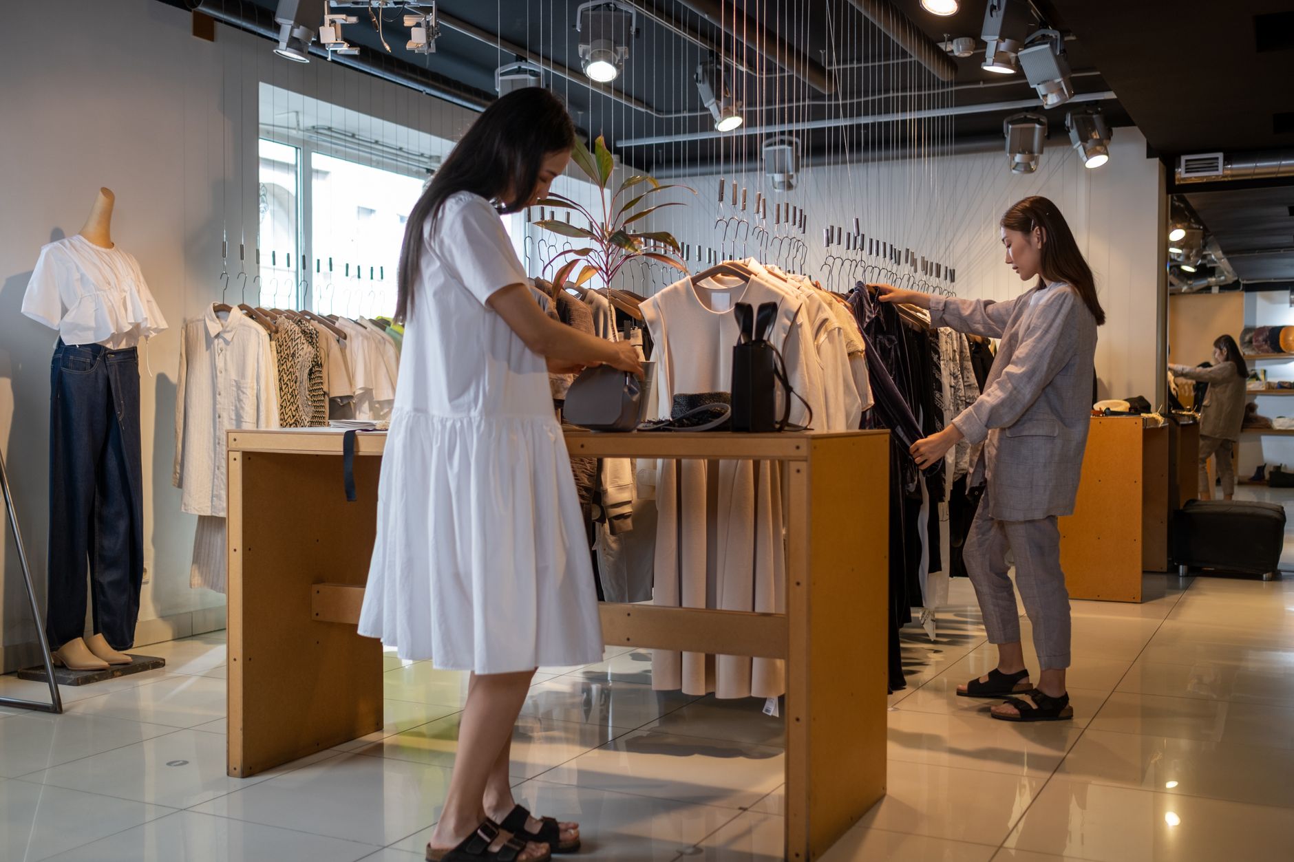 Modern retail store interior with digital displays and product shelving