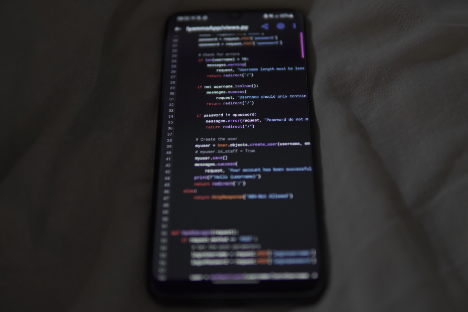 Glide’s No-Code App Builder Is Squeezing Bubble’s SMB Base Developer working on a no-code app interface on a laptop screen