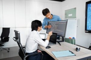 Liveblocks’ Collaboration SDK Is Crowding Ably’s Realtime Dev Base Two developers working together at a computer screen reviewing code
