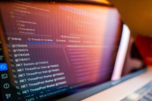 Lovable’s AI App Builder Is Crowding Webflow’s No-Code Base A laptop screen displaying web application code, representing AI-assisted app development