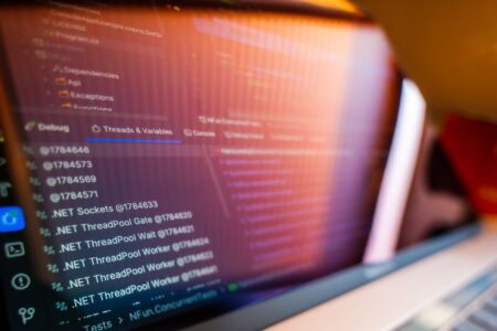 Lovable’s AI App Builder Is Crowding Webflow’s No-Code Base A laptop screen displaying web application code, representing AI-assisted app development