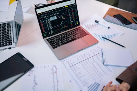 Hex’s Collaborative Notebooks Are Quietly Cornering Databricks’ Analyst Base A data analyst working at a computer with multiple screens displaying data visualizations and code
