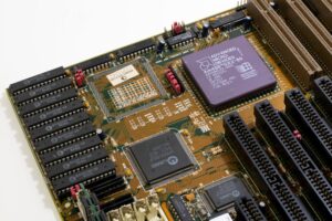 Close-up of a semiconductor chip representing AI inference hardware